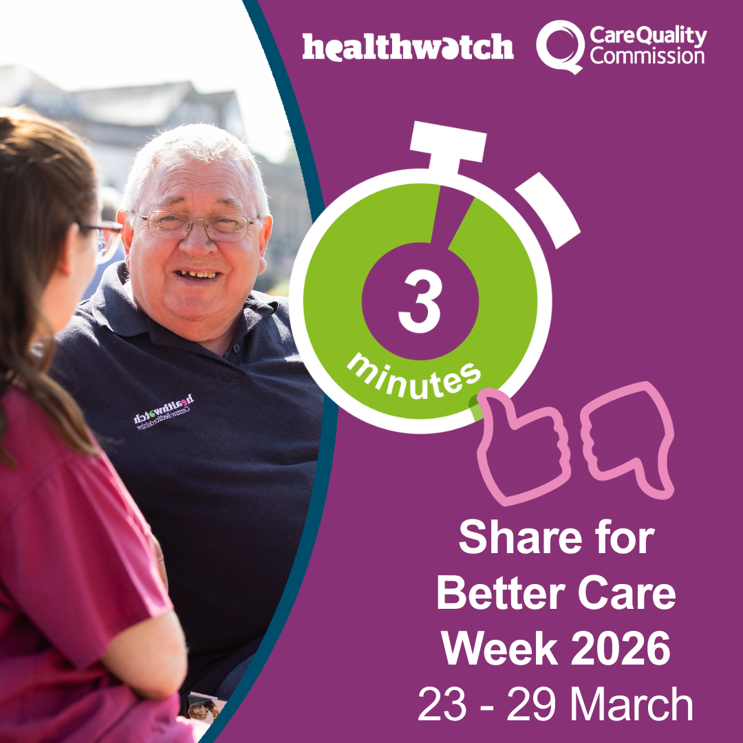 A man in blue shirt with glasses sits on a bench looking at the camera in conversation with a woman in pink scrubs sitting next to him looking away from the camera.